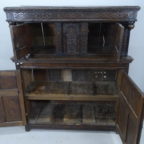 2070 - A 17th century carved oak 2-section court cupboard, 126 x 147 x 50cm