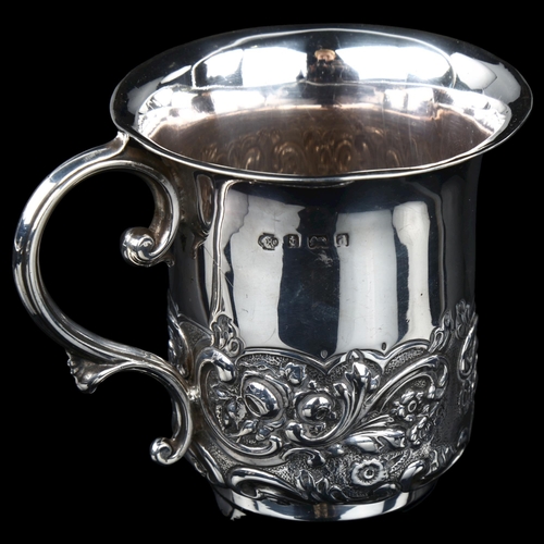 1682 - An Edwardian silver christening mug, half relief embossed foliate decoration, by William Hutton & So... 