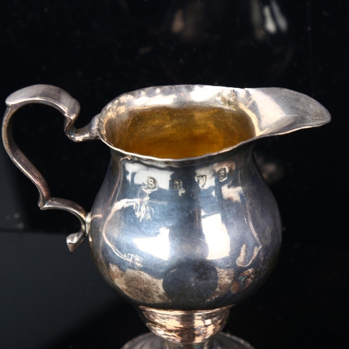 1696 - A George III silver helmet cream jug, indistinct maker's marks, hallmarks London 1781, height 10cm, ... 