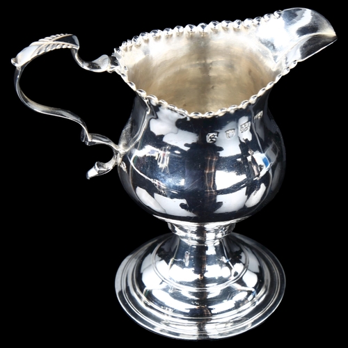 1697 - A George III silver helmet cream jug, indistinct maker's marks, hallmarks London 1793, height 10cm, ... 