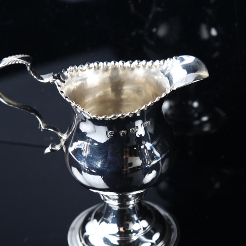 1697 - A George III silver helmet cream jug, indistinct maker's marks, hallmarks London 1793, height 10cm, ... 