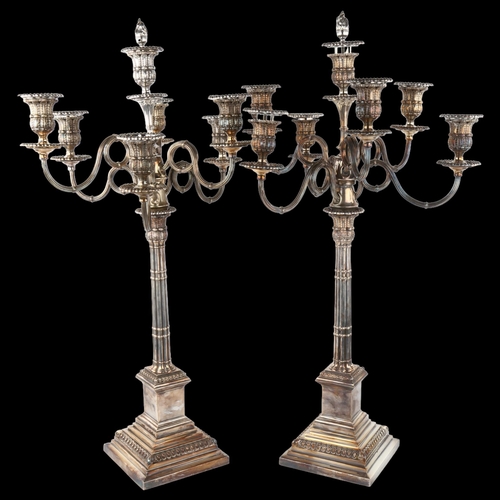 1704 - A large fine quality pair of Neo-Classical style silver plated 7-light candelabra, by Richard Hodd, ... 