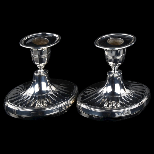 1707 - A matched pair of Neo-Classical style silver squat table candlesticks, by Lambert & Co and Hawkswort... 