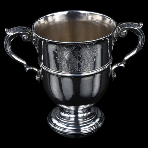 1715 - An Irish George II/George III silver 2-handled presentation trophy cup, with engraved armorial crest... 