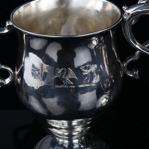 1717 - A pair of Irish George III silver 2-handled presentation trophy cups, circular bulbous form with scr... 