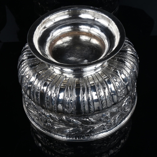 1718 - A large early 20th century unmarked silver rose bowl, circular bulbous form with relief embossed flo... 