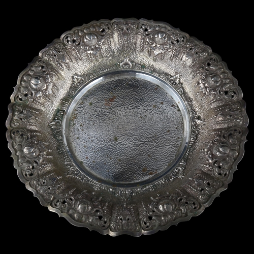 1721 - A large Continental 800 silver fruit bowl, relief embossed and pierced decoration with scalloped rim... 