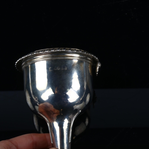 1722 - A George IV silver wine funnel, with strainer insert, gadrooned rim and shell clip, by Rebecca Emes ... 