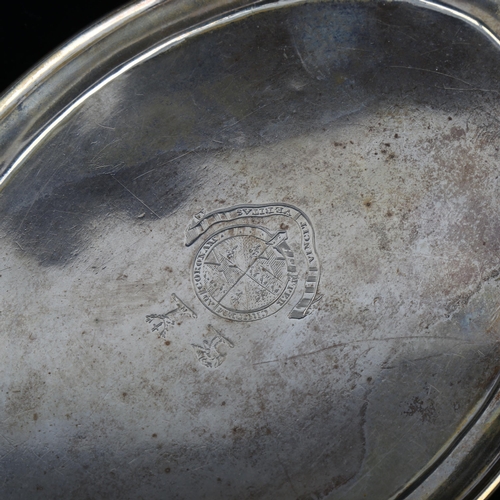 1724 - A pair of Irish George III silver oval teapot stands, with engraved armorial crests, by Robert Bread... 