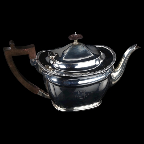 1732 - An Edwardian silver teapot, oval form with gadrooned rim and turned wood mounts, by Martin Hall & Co... 