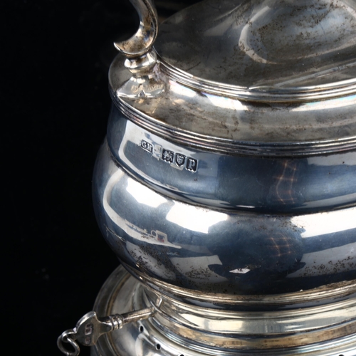 1735 - A George V silver kettle on stand, with ebonised handle and finial, by Harrison Brothers and Howson,... 