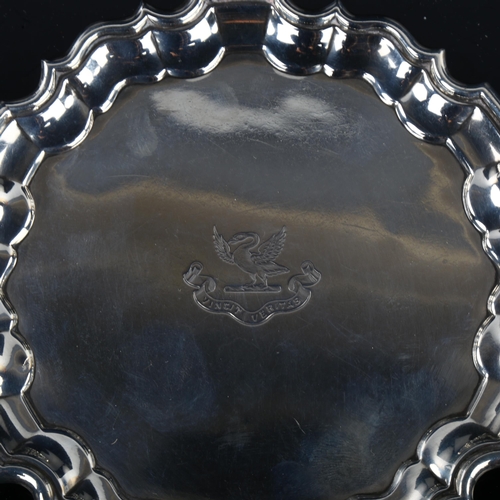 1740 - An Edwardian silver salver, circular form with scalloped rim and swan crest 