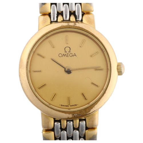 1087 - OMEGA - a lady's gold plated stainless steel De Ville quartz bracelet watch, champagne dial with gil... 