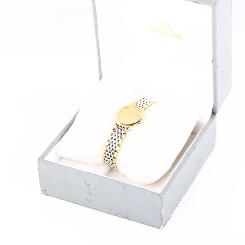 1087 - OMEGA - a lady's gold plated stainless steel De Ville quartz bracelet watch, champagne dial with gil... 