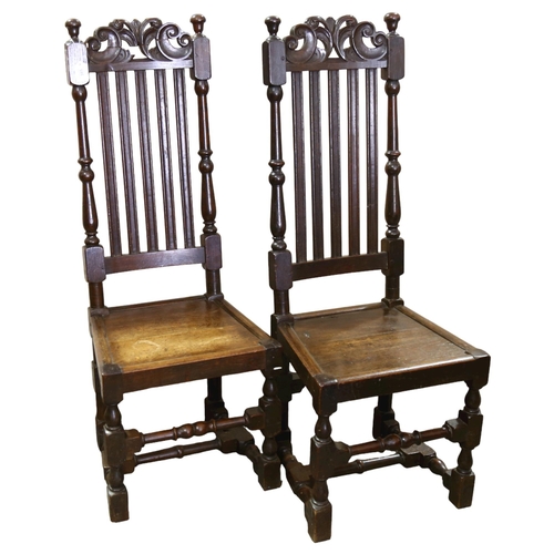 385 - A pair of 19th century oak carved and turned oak chairs, height 117cm