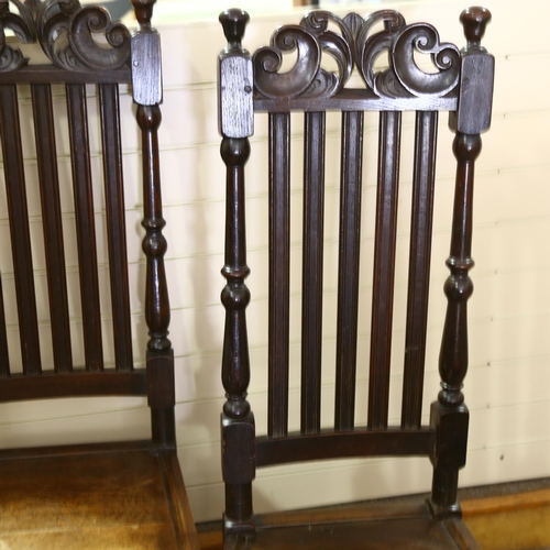 385 - A pair of 19th century oak carved and turned oak chairs, height 117cm