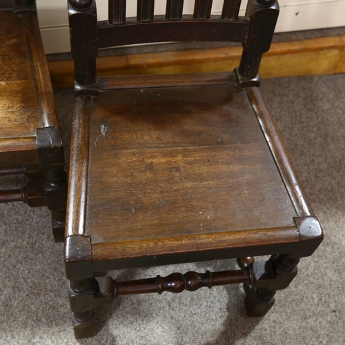 385 - A pair of 19th century oak carved and turned oak chairs, height 117cm