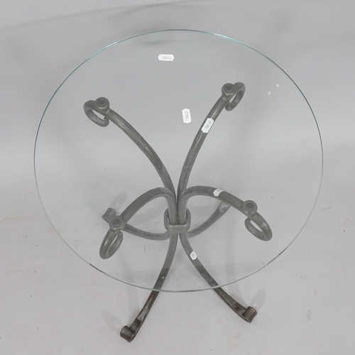 2078 - A circular glass-top occasional table, on wrought-iron base, 35cm x 62cm