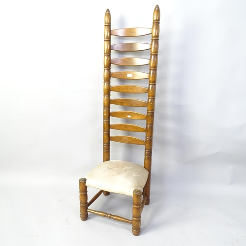 2039 - A mid-century French tall ladder-back chair, in the manner of Charles Dudouyt