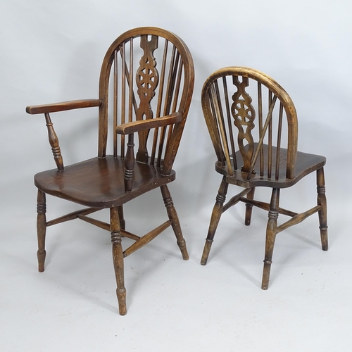 2047 - A matched set of 5 wheelback dining chairs (5+1)