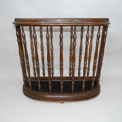 2053 - An oak stick/umbrella stand with painted metal drip tray. 75cm x 66cm x 24cm