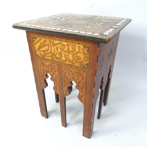 2059 - A Moorish hardwood square topped occasional table with carved and inlaid mother of pearl decoration,... 