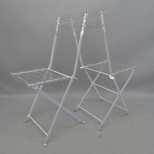 2085 - A set of 4 lucite and white enamelled steel folding bistro style chair