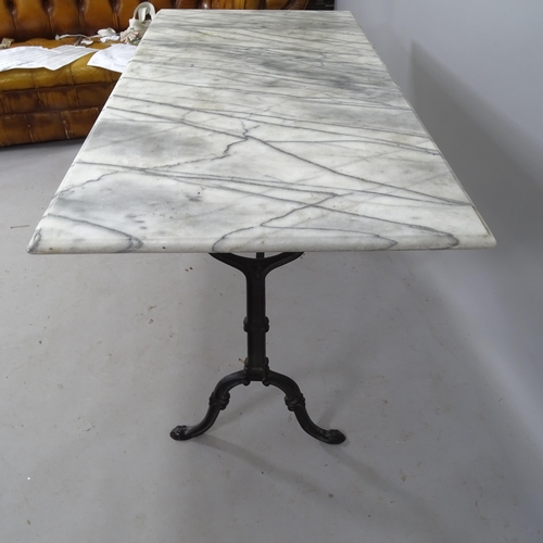 2087 - A rectangular marble-top garden table, on cast-iron base, 120 x 71 x 6cm