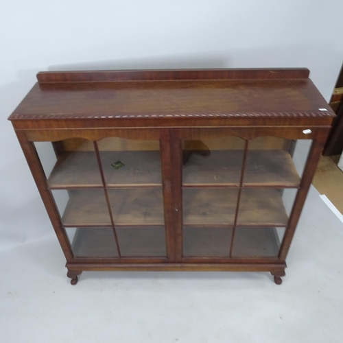 2089 - A 1930s mahogany display cabinet, with 2 glazed panelled doors and raised back on cabriole legs, 124... 