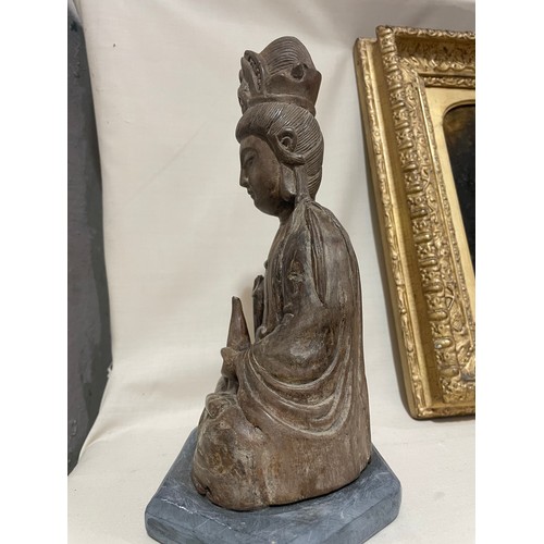 287 - An Antique Oriental carved wood Buddha, on later slate base, height 26cm