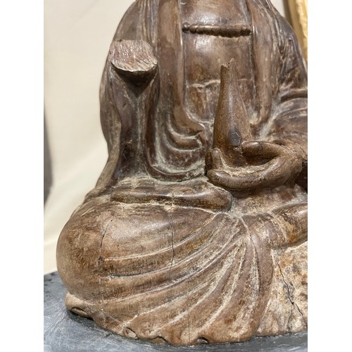 287 - An Antique Oriental carved wood Buddha, on later slate base, height 26cm