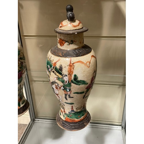 277 - A Japanese porcelain bottle and stopper, with hand painted decoration, 6 character mark, height 27cm... 