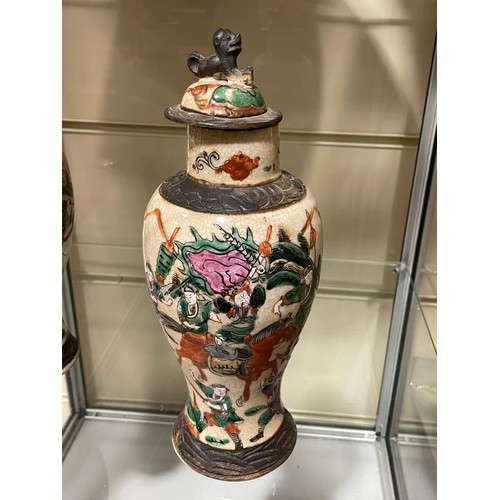 277 - A Japanese porcelain bottle and stopper, with hand painted decoration, 6 character mark, height 27cm... 