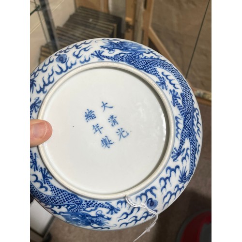 356 - A Chinese blue and white porcelain dragon dish, 6 character mark, diameter 16.5cm