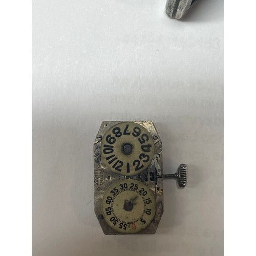 1043 - An Art Deco silver Jump Hour mechanical wristwatch, circa 1930s, double enamel dials with Arabic num... 