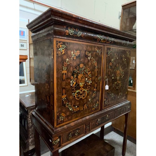 216 - An exceptional William and Mary oyster laburnum and marquetry inlaid cabinet on stand, covered in sp... 