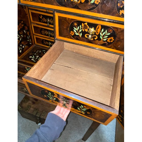 216 - An exceptional William and Mary oyster laburnum and marquetry inlaid cabinet on stand, covered in sp... 