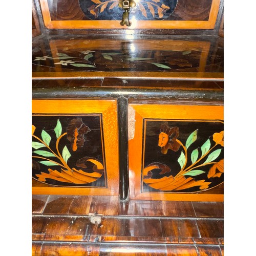 216 - An exceptional William and Mary oyster laburnum and marquetry inlaid cabinet on stand, covered in sp... 