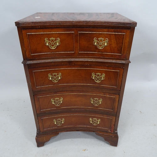 2201 - A reproduction mahogany concave bedside chest of four long drawers. 48cm x 72cm x 36cm