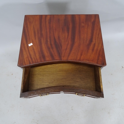 2201 - A reproduction mahogany concave bedside chest of four long drawers. 48cm x 72cm x 36cm