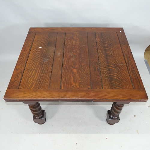 2206 - An early 20th century oak draw-leaf dining table on barley twist legs. 113cm (extending to 199cm) x ... 