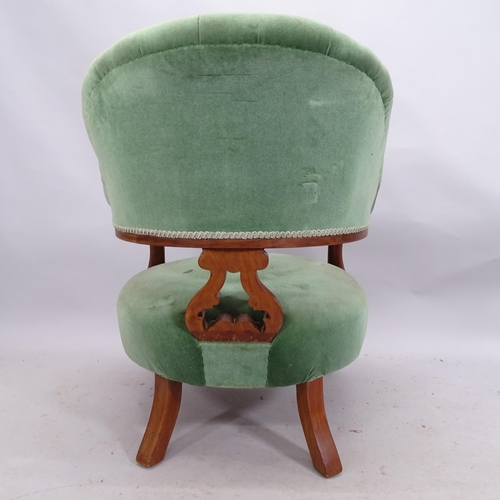 2209 - A Victorian walnut and upholstered open armchair