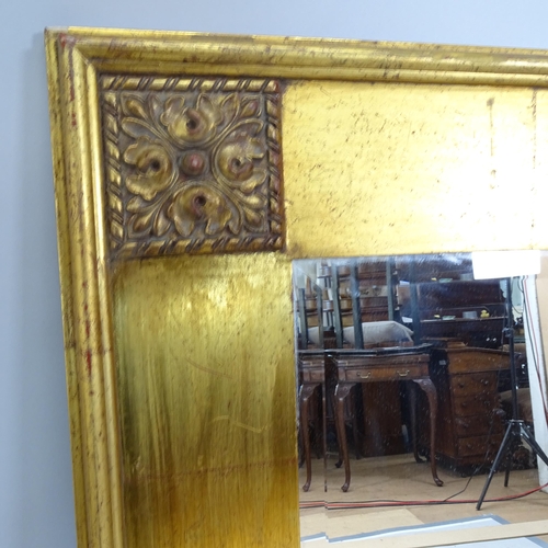 2221 - A modern gilt-framed bevel edgved wall mirror. 85cm x 115cm