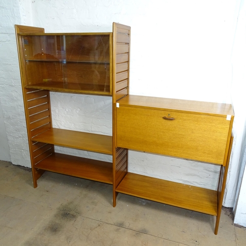 2223 - A mid-century teak Staple's ladderax modular system comprising of bureau desk, glazed cabinet and 3 ... 