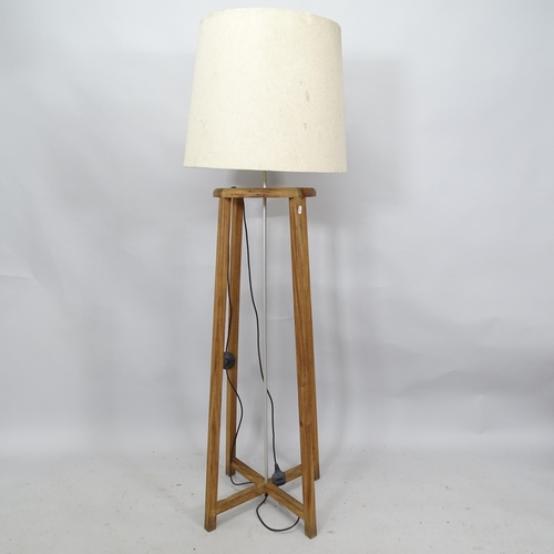 2227 - A mid-century teak standard lamp and shade, Height to bayonet fitting 129cm