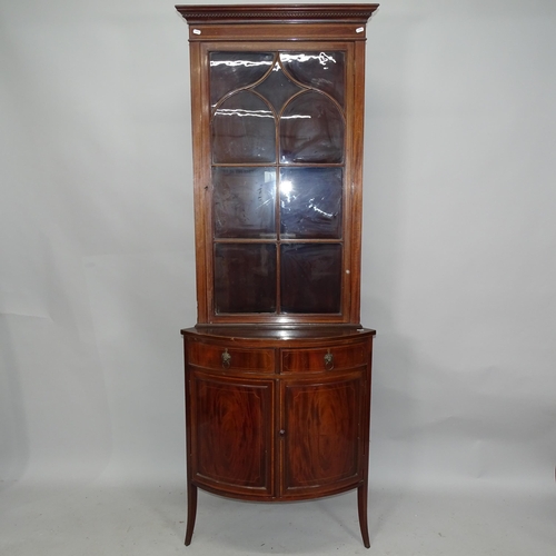 2229 - A 19th century mahogany and satinwood-strung two-section corner cupboard, the top section having a l... 