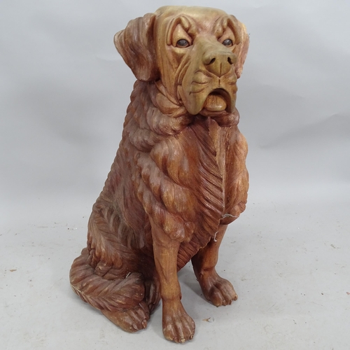 2231 - A carved wooden sculpture, study of a dog. Height 78cm