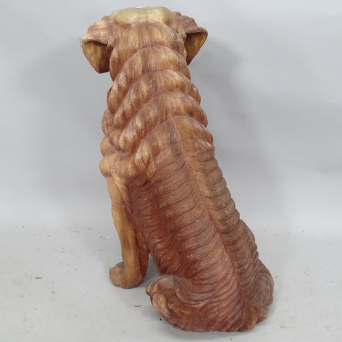 2231 - A carved wooden sculpture, study of a dog. Height 78cm