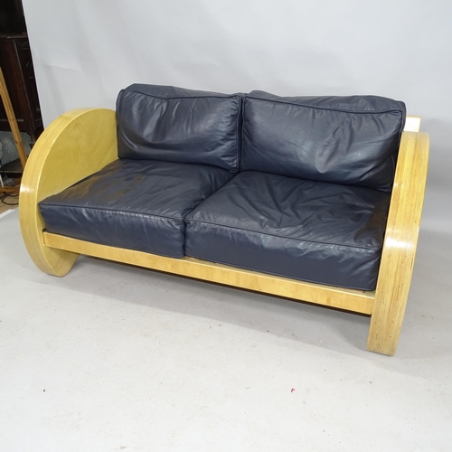 2233 - A contemporary craftsman made knock down sofa in laminated birch, of Art Deco style with leather cus... 