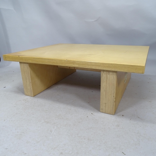 2234 - A contemporary craftsman made knock down coffee table in laminated birch with prominent maker's logo... 